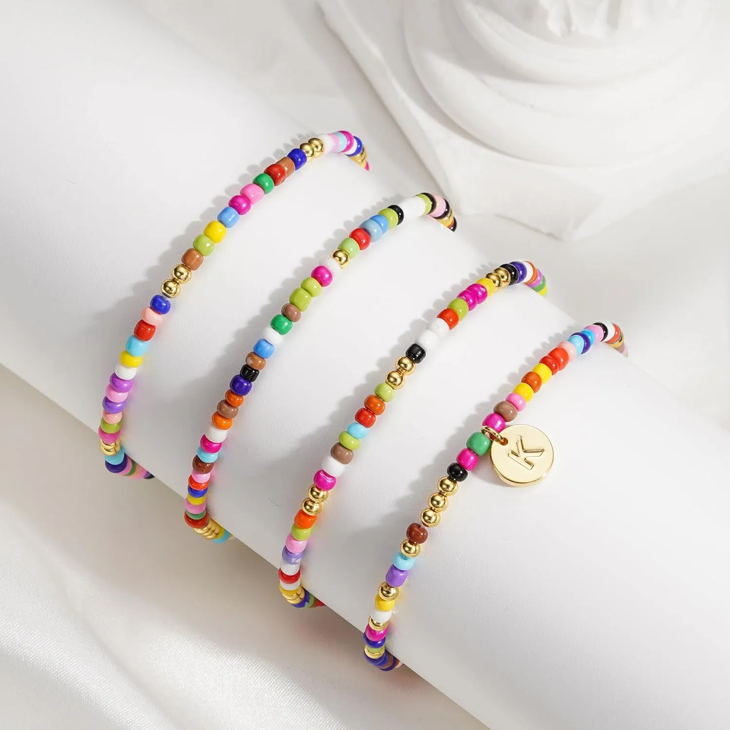 Turandoss 4PCS Colorful Beaded Initial Bracelets for Women Teen Girls - Cute Stretch Beaded Bohemian Disc Initial A-Z Stackable Bracelets Jewelry for Girls Women Teens Birthday Gifts